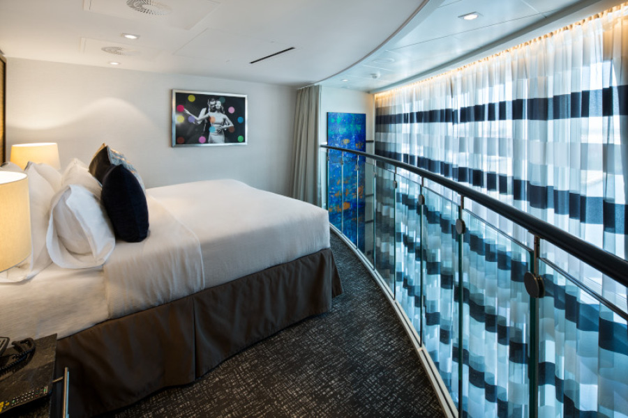 Спальня в каюте Grand Loft Suite на лайнерах класса Quantum Class